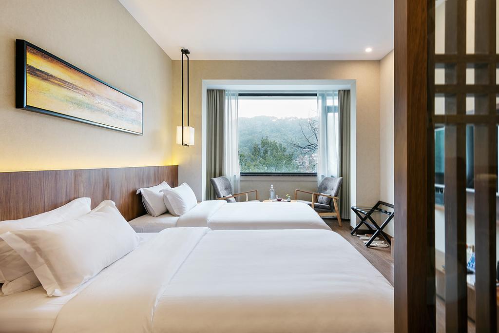 Hangzhou Puyu Travelling With Hotel Exterior foto
