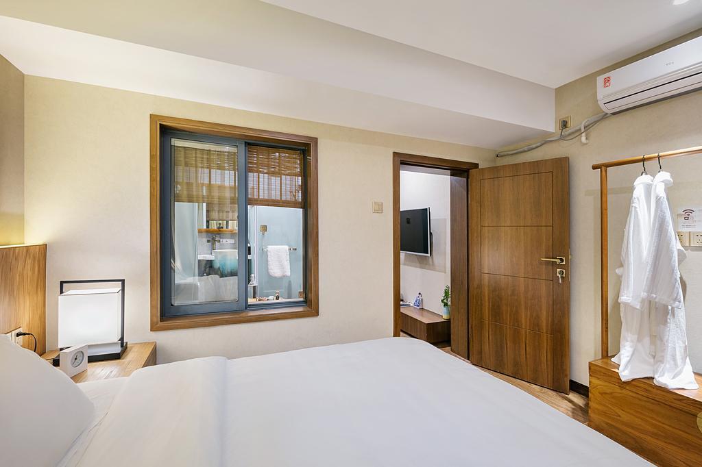 Hangzhou Puyu Travelling With Hotel Exterior foto